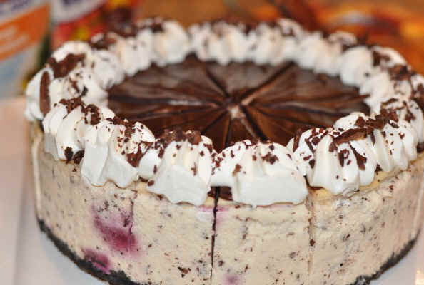 Mr Cheesecake Texas - cherries garcia-new flavor, dark chocolate shavings and real cherries in a dilicioso combination cheesecake, chocolate crust, cheesecake, then silky dark chocolate topping, whipped cream and dark chocolate shavings-yum! 